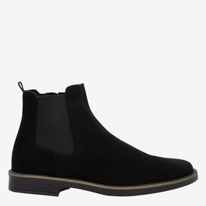 Botines de hombre negros de ante con elástico lateral y suela beige