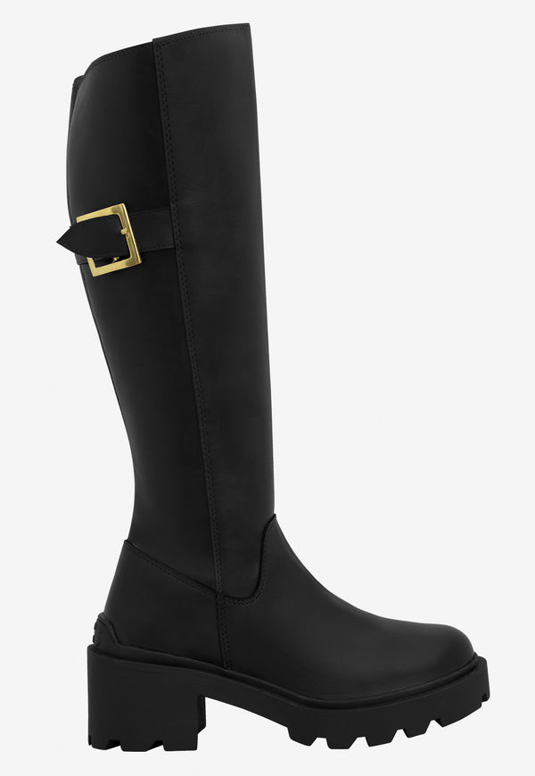Botas altas negras con hebilla dorada y tacón grueso, suela con dibujo